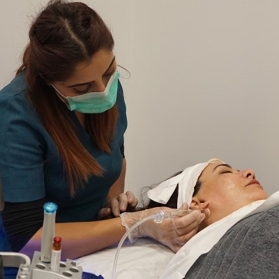 person getting Hydra Facial treatment
