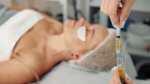 Cosmetic expert preparing PRP injection before vampire facial